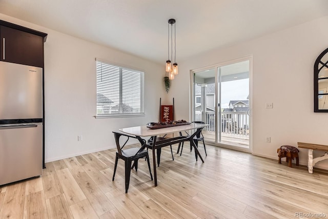 1420 E Witherspoon Dr, Elizabeth, CO 80107 - dining room featuring light wood-type flooring and baseboards