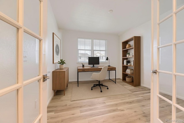 1420 E Witherspoon Dr, Elizabeth, CO 80107 - office with french doors, wood finished floors, and baseboards