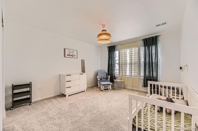 1420 E Witherspoon Dr, Elizabeth, CO 80107 - carpeted bedroom with baseboards and a nursery area