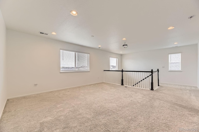 1420 E Witherspoon Dr, Elizabeth, CO 80107 - carpeted empty room with healthy amount of natural light, recessed lighting, and baseboards