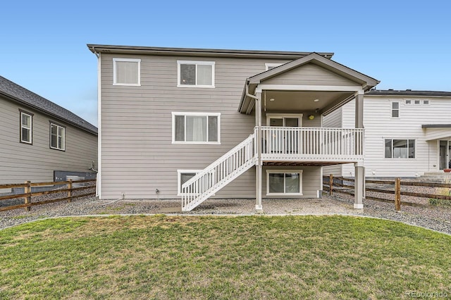 1420 E Witherspoon Dr, Elizabeth, CO 80107 - rear view of house with stairway and a deck