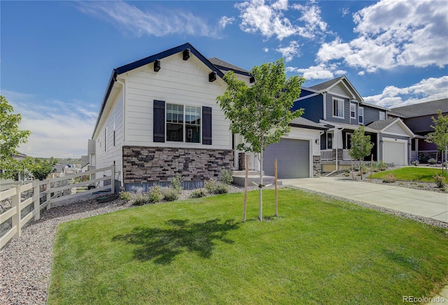 view of front of property with a garage and a front yard