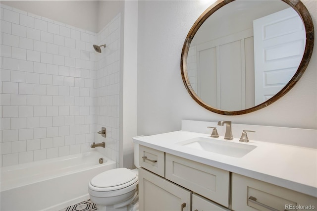 full bathroom with vanity, toilet, and tiled shower / bath combo