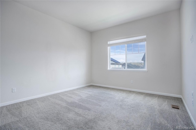 empty room with carpet floors