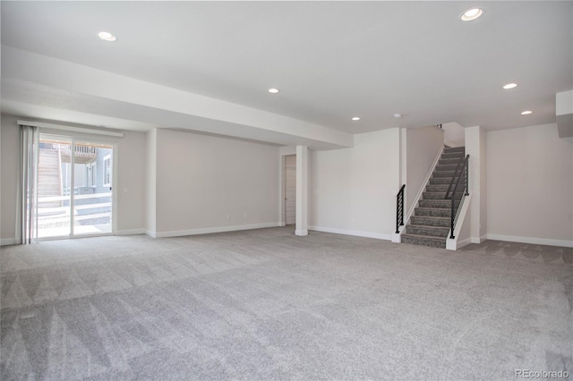 basement with light colored carpet