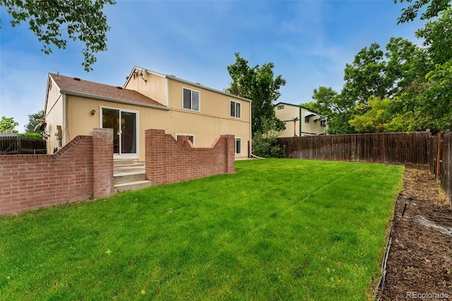 11532 Newland St, Westminster, CO 80020 - rear view of house featuring a fenced backyard