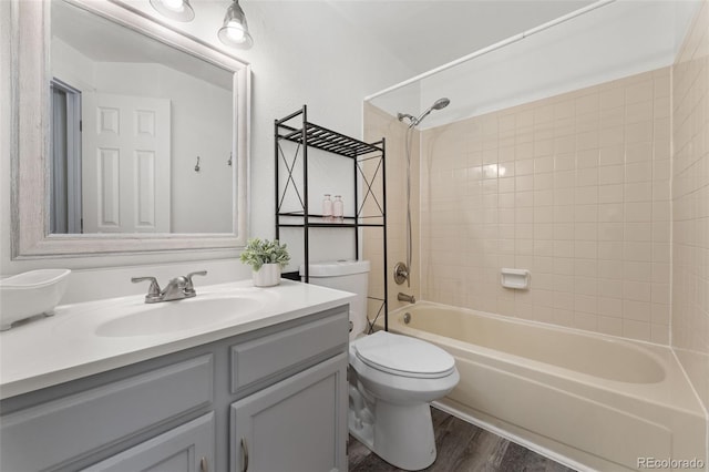 11532 Newland St, Westminster, CO 80020 - bathroom with vanity,  shower combination, and wood finished floors