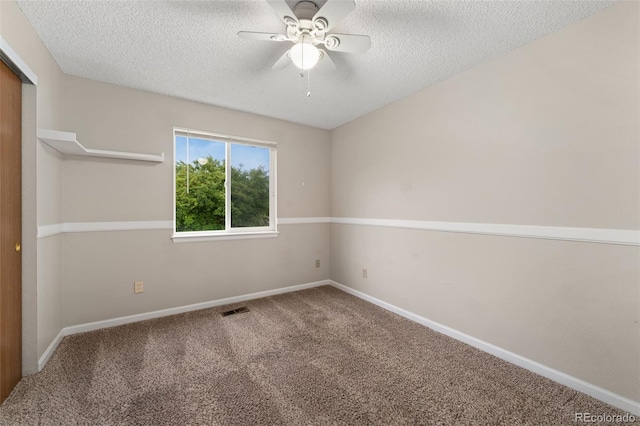 11532 Newland St, Westminster, CO 80020 - empty room featuring a textured ceiling, carpet, and a ceiling fan