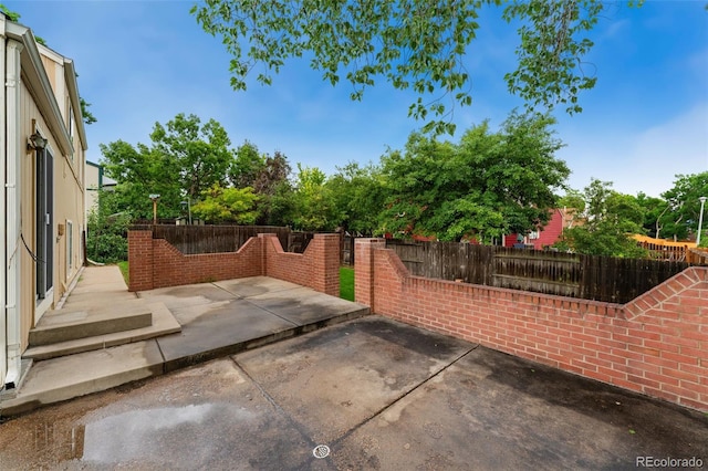 11532 Newland St, Westminster, CO 80020 - fenced backyard with a patio