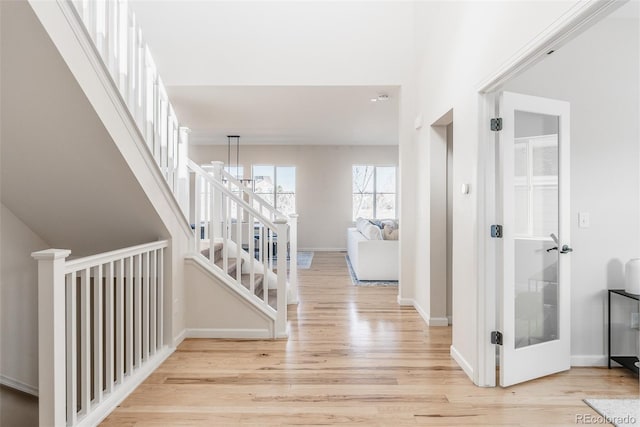 hallway featuring light wood-type flooring