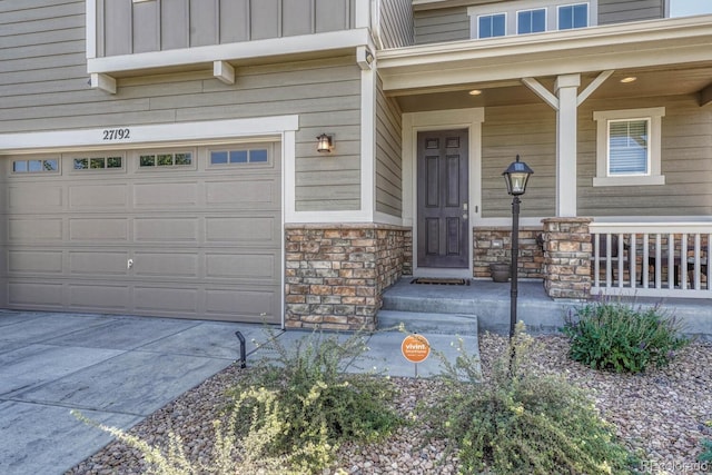 entrance to property featuring a garage