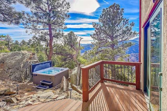 2433 Dogie Spur, Golden, CO 80403 - wooden deck with a hot tub