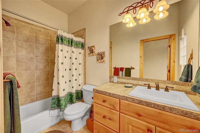 2433 Dogie Spur, Golden, CO 80403 - full bath with toilet, vanity, shower / bath combo with shower curtain, tile patterned floors, and a chandelier