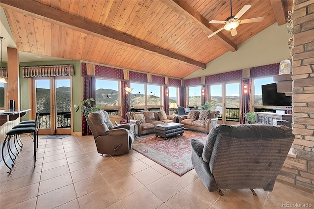 2433 Dogie Spur, Golden, CO 80403 - living area featuring wooden ceiling, light tile patterned floors, and ceiling fan