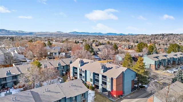 birds eye view of property featuring a mountain view