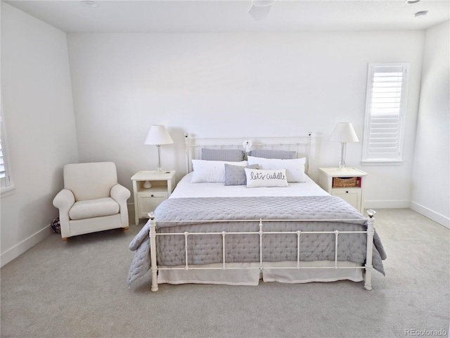 bedroom with light carpet