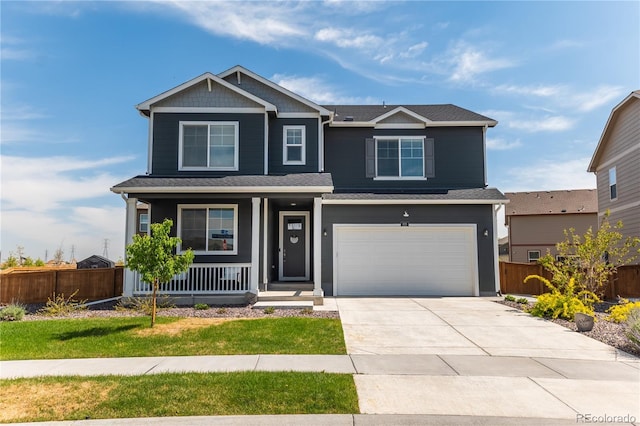 920 William Way, Brighton, CO 80603 - craftsman inspired home featuring a porch, fence, concrete driveway, a garage, and a shingled roof