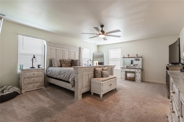920 William Way, Brighton, CO 80603 - bedroom featuring light colored carpet and a ceiling fan