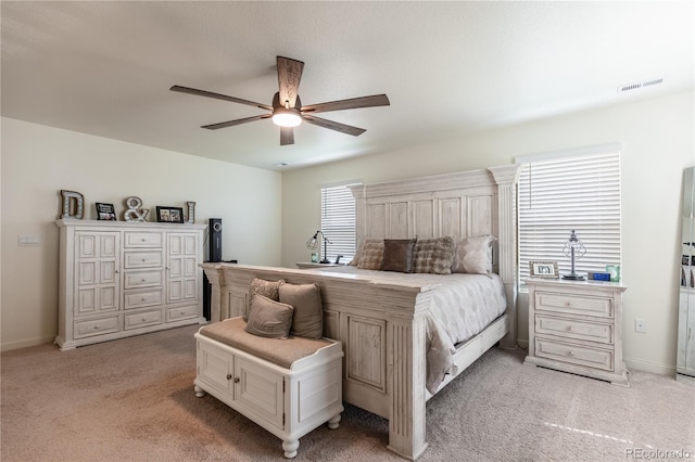 920 William Way, Brighton, CO 80603 - bedroom featuring light colored carpet, a ceiling fan, and baseboards