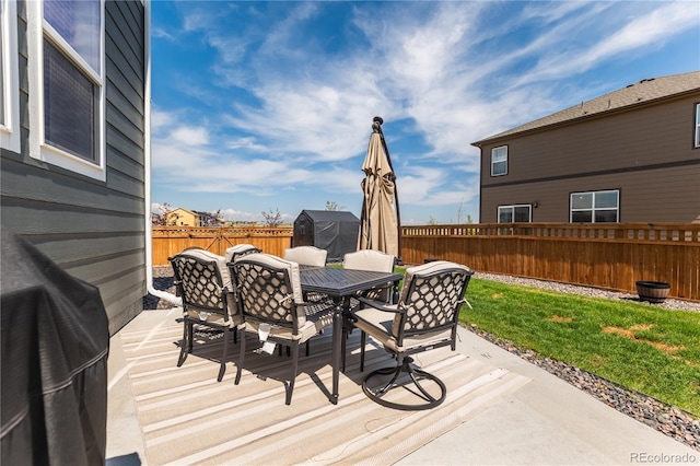 920 William Way, Brighton, CO 80603 - deck featuring outdoor dining area and a patio