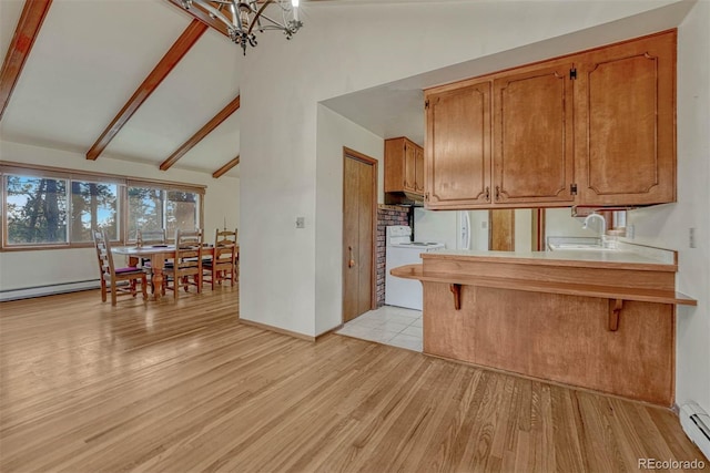 kitchen with vaulted ceiling with beams, light wood-style flooring, a notable chandelier, a sink, and light countertops