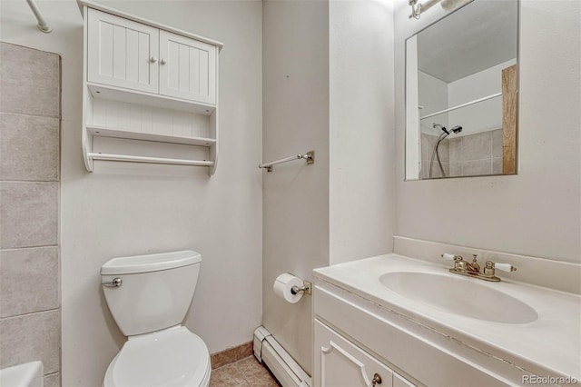 full bath with a baseboard radiator, toilet, vanity, walk in shower, and tile patterned floors