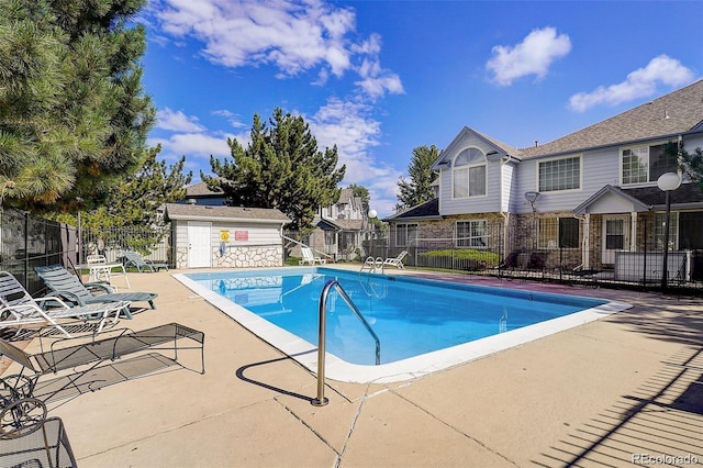 view of swimming pool featuring a patio