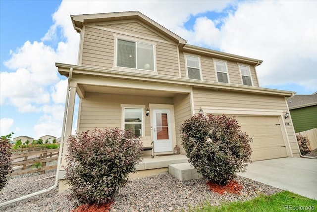7218 Animas Ave, Frederick, CO 80530 - view of front of home with concrete driveway and an attached garage