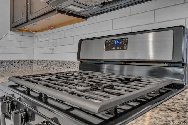 7218 Animas Ave, Frederick, CO 80530 - kitchen view of stainless steel gas range and backsplash