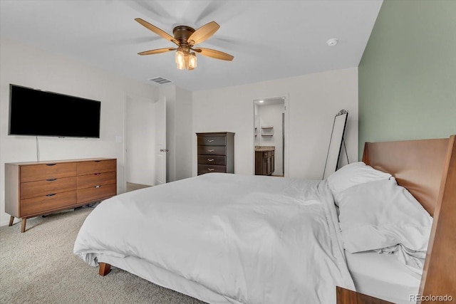 7218 Animas Ave, Frederick, CO 80530 - bedroom featuring light colored carpet, a ceiling fan, and ensuite bathroom
