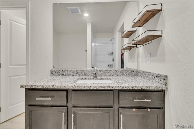 7218 Animas Ave, Frederick, CO 80530 - bathroom featuring vanity and a stall shower