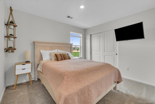 7218 Animas Ave, Frederick, CO 80530 - bedroom featuring light colored carpet, baseboards, a closet, and recessed lighting