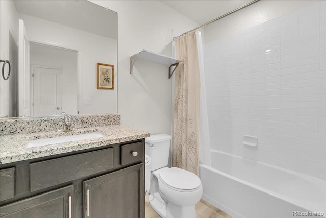 7218 Animas Ave, Frederick, CO 80530 - full bathroom with toilet, vanity, shower / bath combo with shower curtain, and wood finished floors