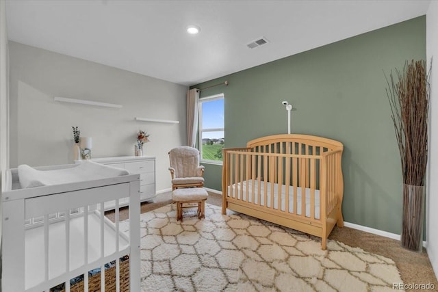 7218 Animas Ave, Frederick, CO 80530 - carpeted bedroom with baseboards, a nursery area, and recessed lighting