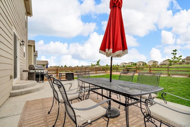7218 Animas Ave, Frederick, CO 80530 - view of patio / terrace with outdoor dining space and a grill