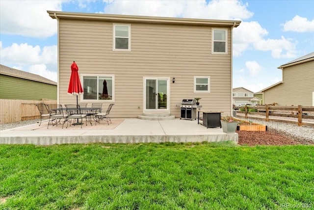 7218 Animas Ave, Frederick, CO 80530 - back of house featuring a patio