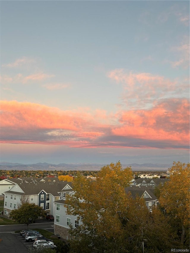 property's view of city with a residential view and a mountain view