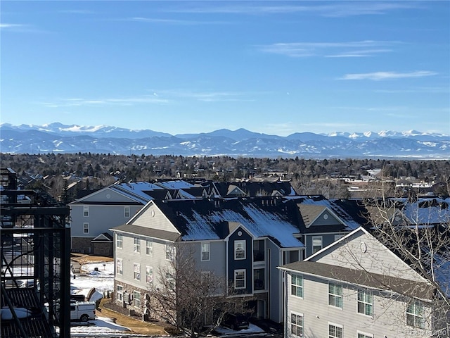 exterior space with a residential view and a mountain view