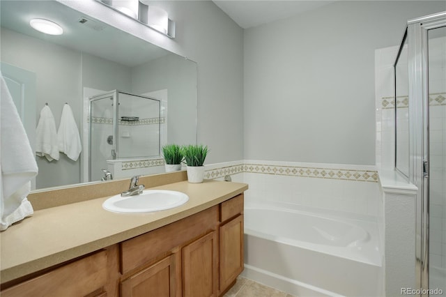 bathroom featuring a garden tub, tile patterned flooring, visible vents, vanity, and a shower stall