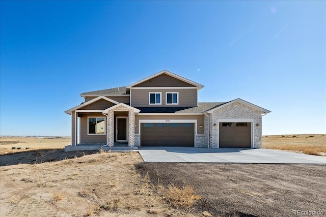 view of front of property with a garage