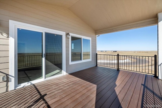 wooden terrace with a rural view