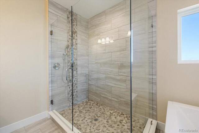 bathroom with an enclosed shower