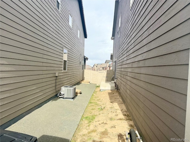 view of property exterior with central air condition unit