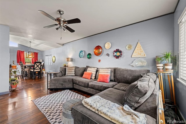 living room featuring lofted ceiling, dark wood-type flooring, and ceiling fan