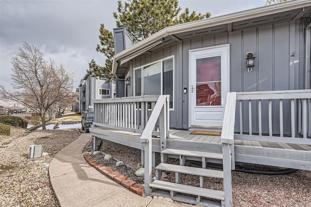 entrance to property featuring a deck