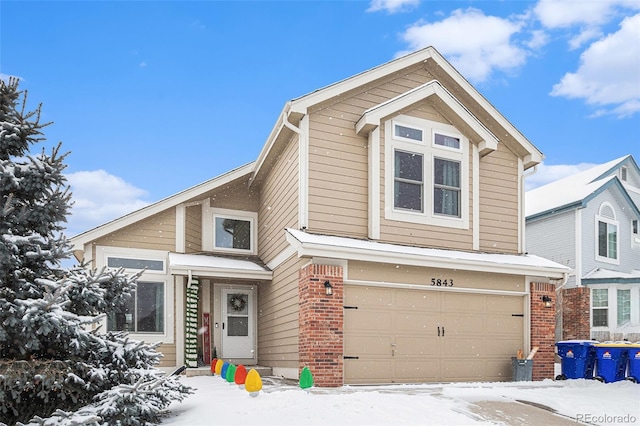 view of front of home with a garage