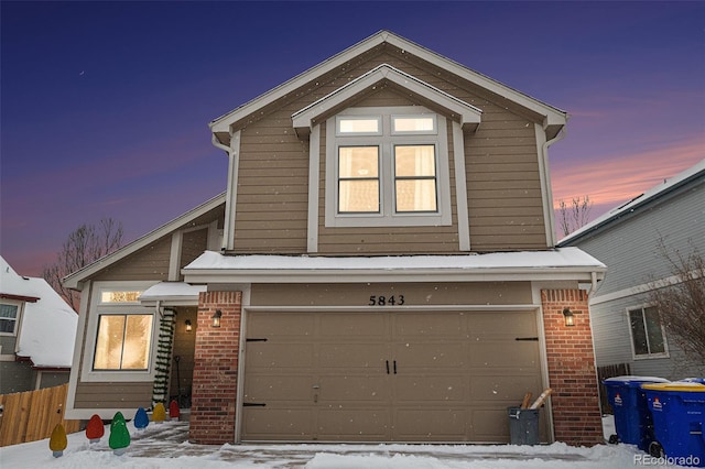 view of front of property featuring a garage