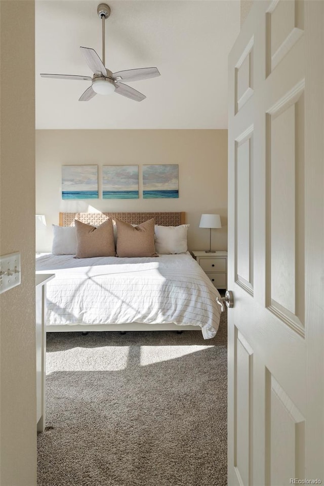 2250 S Vaughn Way Unit 204, Aurora, CO 80014 - bedroom featuring ceiling fan and carpet flooring