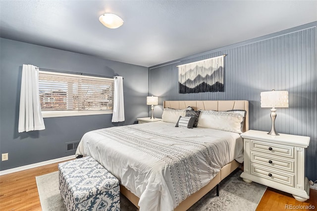 bedroom featuring wood-type flooring