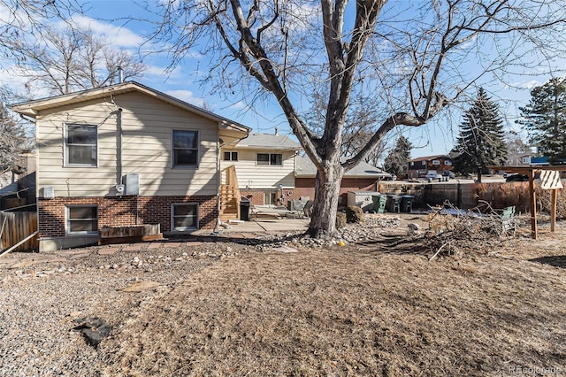 rear view of property with a patio area